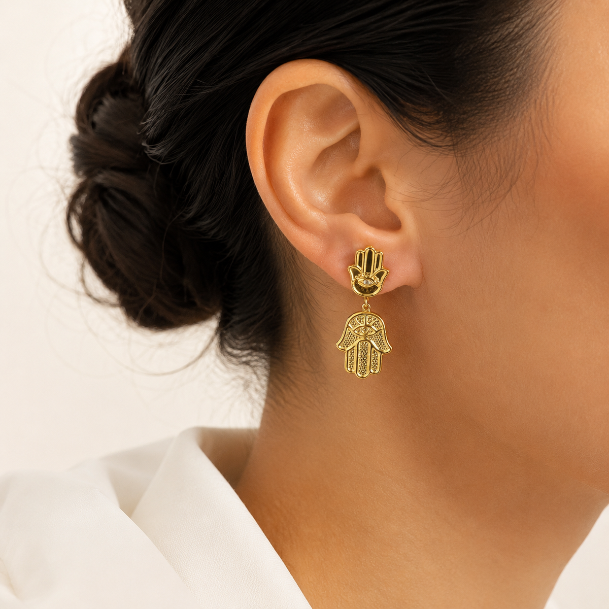 Petite Hamsa Drop Earrings model image